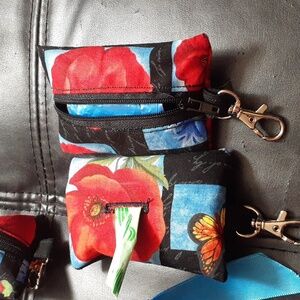 Doggy Poop Bag holder. Attach to belt, or leash while walking your pet.  NWOT